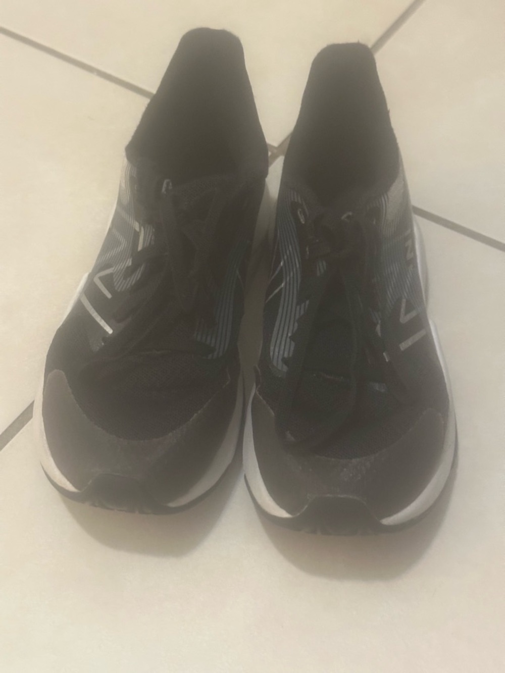 New Balance Black Youth Sneakers with White Accents